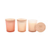 Set of three candles on a white background