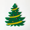 Decorative Christmas tree ornament with colorful dots on a white background