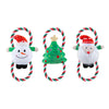 Three Christmas-themed dog toys shaped like a snowman, tree, and Santa Claus with colorful ropes on a white background.
