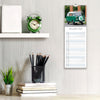 Calendar with a green van design on a wall next to stationery items.