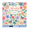 A 2027 weekly family planner with a colorful floral pattern on a cream background, featuring a blue dry-erase board at the bottom and a black marker.