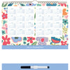 A spiral-bound desk calendar page with a colorful floral border and two yearly calendar grids for 2027 and 2028. A blue banner near the bottom reads 'USEFUL INFORMATION,' and a black-and-white marker is shown below on a light blue surface.