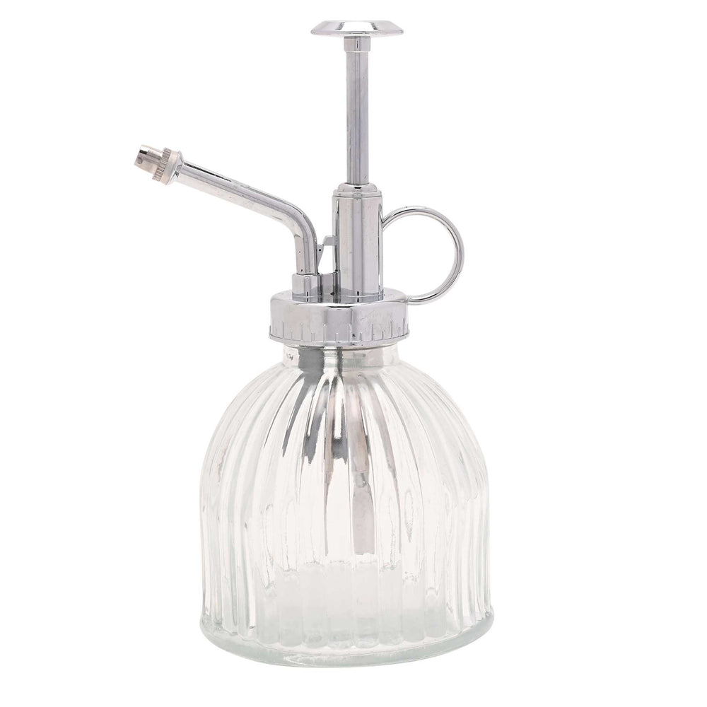 Vintage-style glass plant mister with silver metal nozzle on a white background