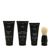 Set of black skincare products with HM branding on a white background
