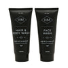 Two black tube packaging of hair and body wash and face wash with Bergamot scent on a white background.