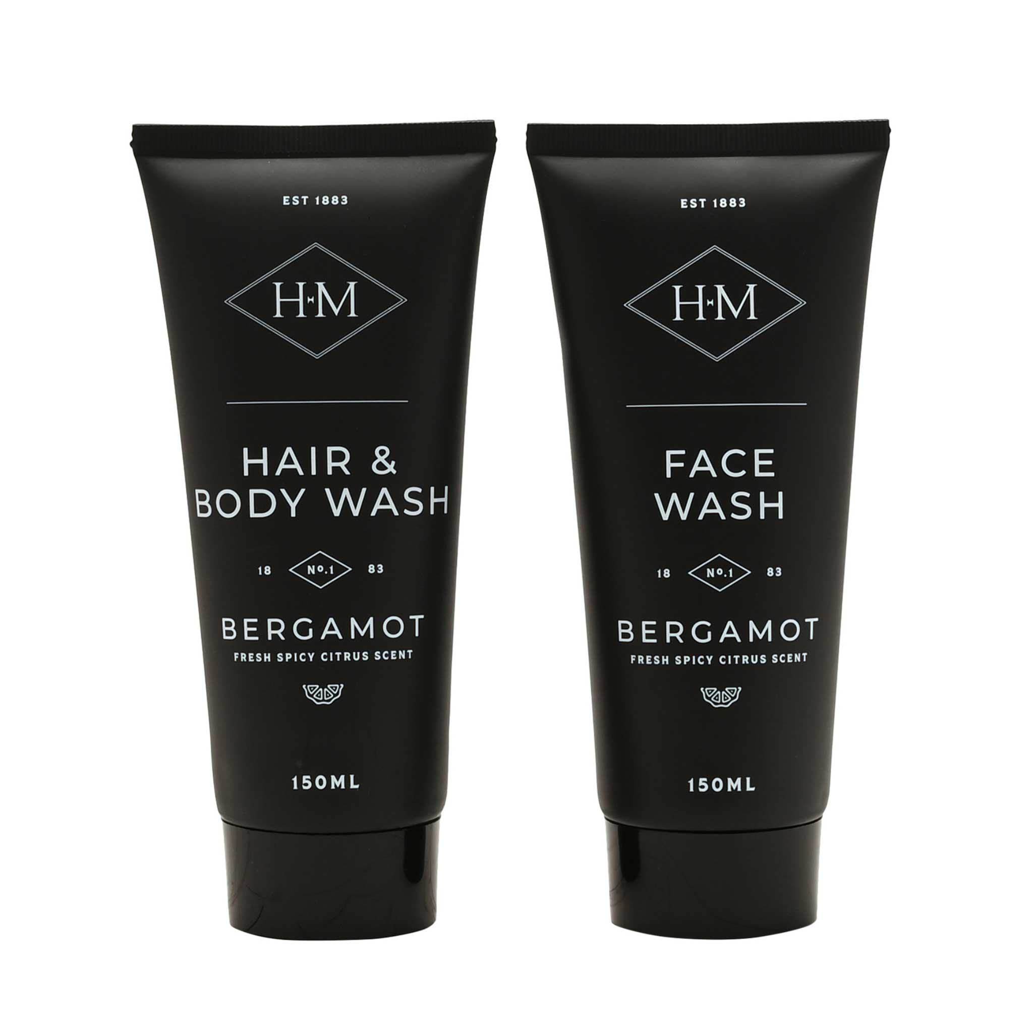 Two black tube packaging of hair and body wash and face wash with Bergamot scent on a white background.