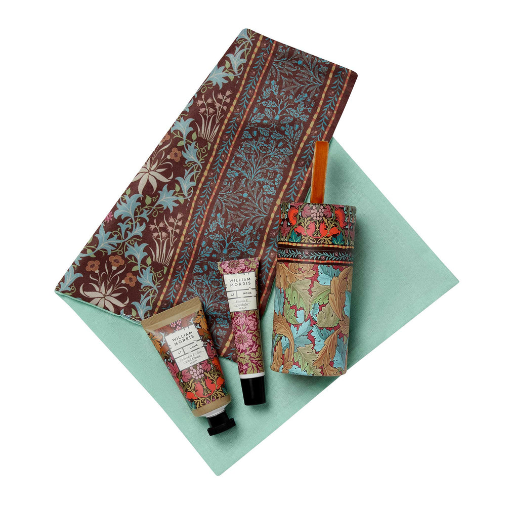 A hand, foot, and knee care gift set on a mint green background.