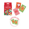 Christmas-themed Jumbo Snap card game set with a red illustrated box, a striped red-and-white card pack, and several sample cards showing Santa and gingerbread illustrations on a white background. Text at the bottom reads '52 MATCHING CARDS'.