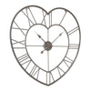 Heart-shaped metal wall clock with an open-frame design, Roman numerals, and decorative hands on a plain white background slightly angled away from camera.