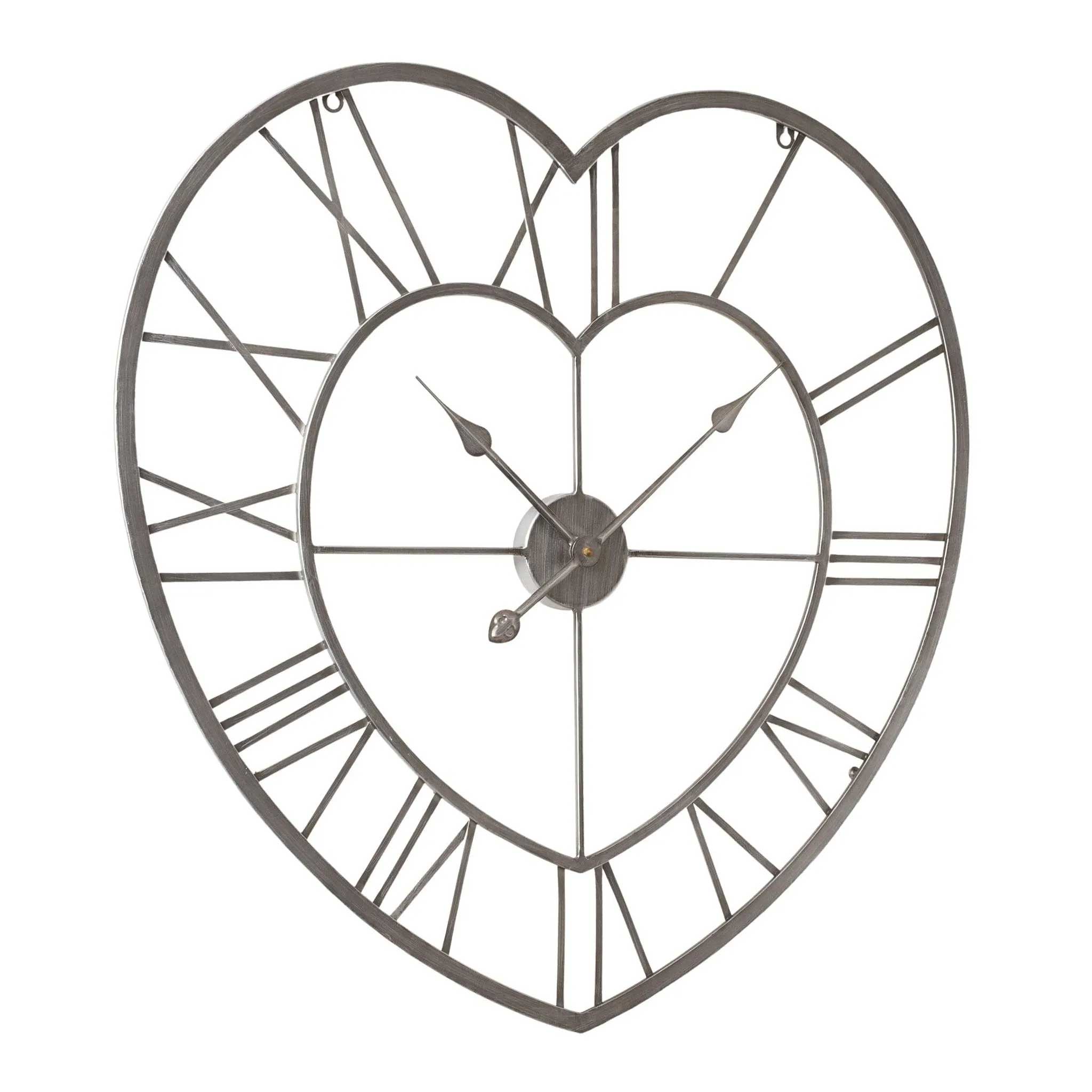 Heart-shaped metal wall clock with an open-frame design, Roman numerals, and decorative hands on a plain white background slightly angled away from camera.