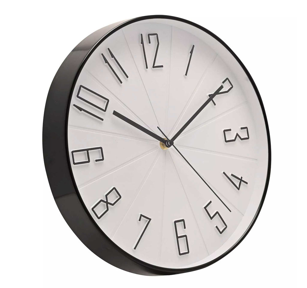 A modern round wall clock with a glossy black frame and hands, featuring minimalist black numerals on a white face, shown against a plain white background.