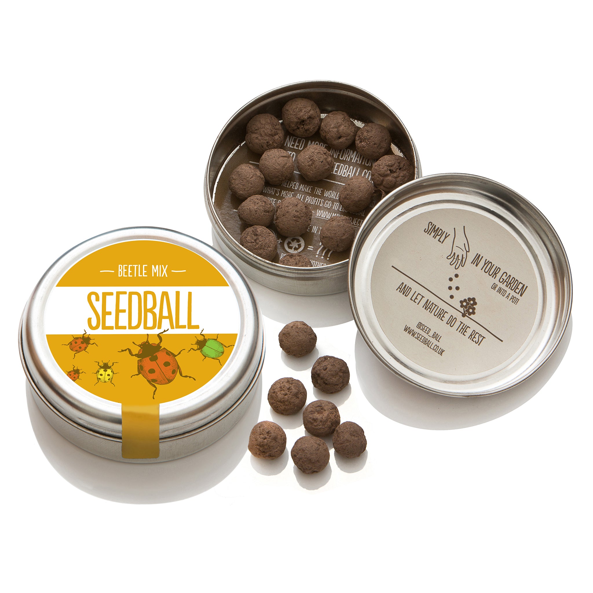 Seedball beetle tin open showing seed balls.