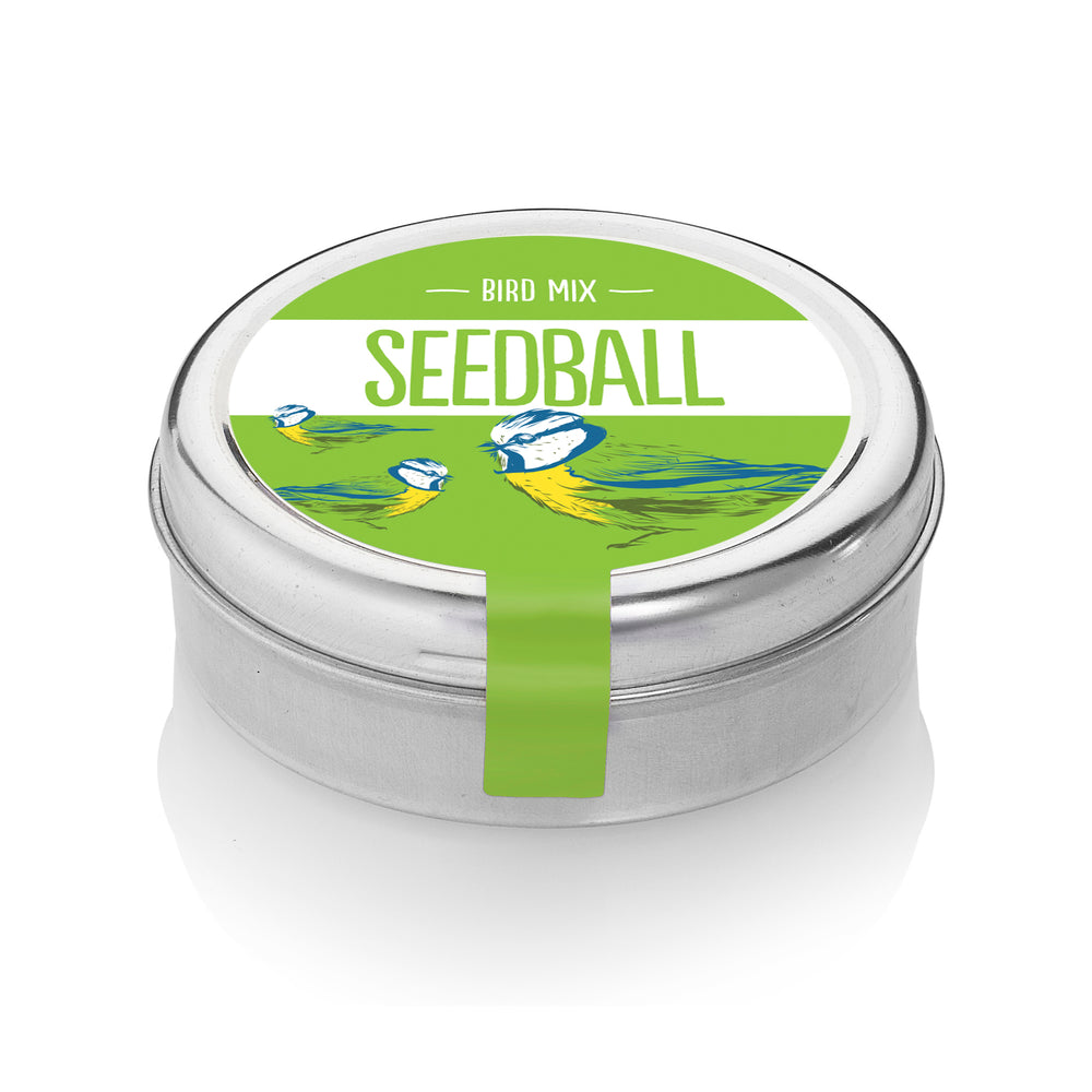 Seedball bird tin against a white background.