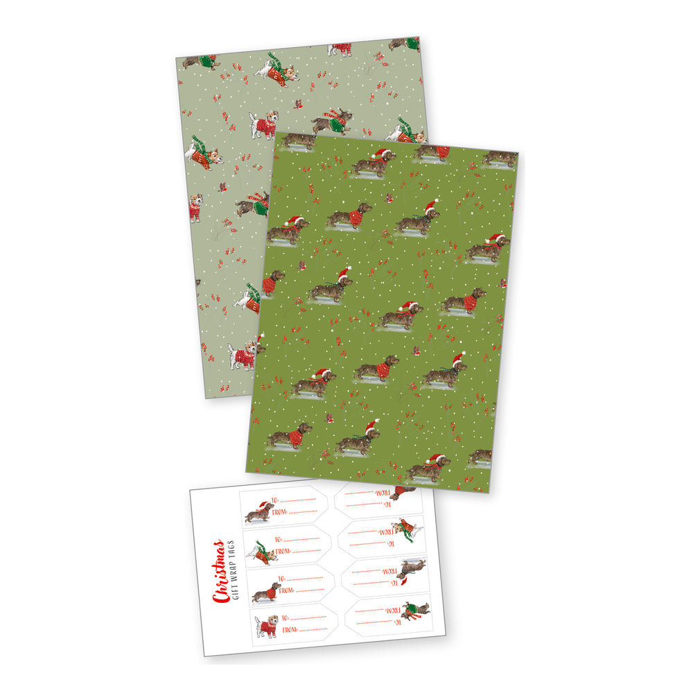 Two sheets of Christmas-themed paper with a dog pattern on a white background with a sheet of stickers.